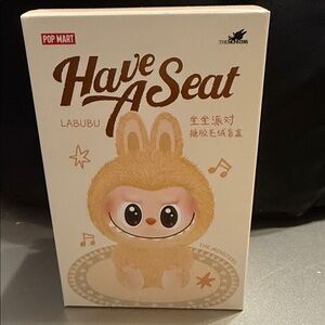 Labubu 'Have A Seat' Figurine - Cream